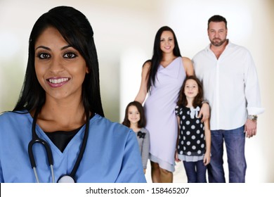 Minority Nurse Working At Her Job In A Hospital