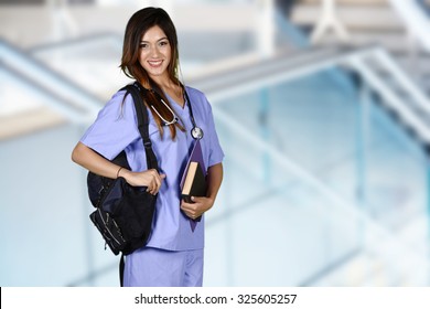 Minority Nursing Student With Her Books Going To Class