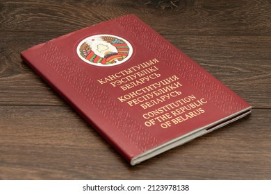 Minsk. Belarus. 02.14.2022. Constitution of the Republic of Belarus on a wooden background. Basic law of Belarus. Close-up.