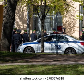 Minsk. Belarus. 05.30.2021. There Are Many Belarusian Uniformed Policemen Near The Police Car.