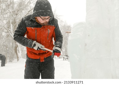 MINSK, BELARUS - 1 March, 2022: Artist Creates Ice Sculpture