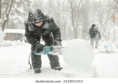 MINSK, BELARUS - 1 March, 2022: Artist Creates Ice Sculpture