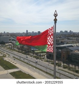 Minsk, Belarus - 25.08.2021: Aerial view of the State Flag Square of the Republic of Belarus. The flag of Belarus flutters in the wind. The official flag of Belarus.
