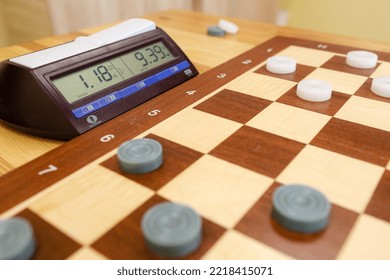 MINSK, BELARUS - 9 SEPTEMBER, 2022: Chess Board And Sports Watch