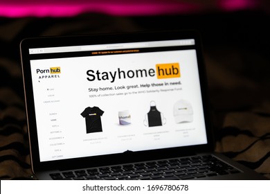 MINSK, BELARUS - April 2020: Apple Macbook laptop with open page PornHub apparel in Safari browser. "Stay Home"concept - Covid19