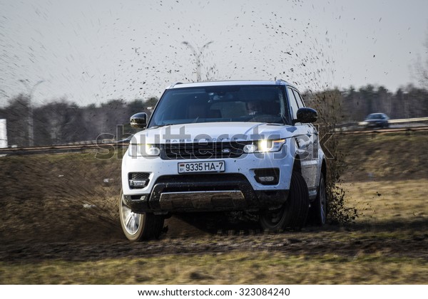 MINSK, BELARUS - APRIL 6, 2014:\
2015 model year Range Rover Sport 3.0 Supercharged goes off-road.\
British SUV is powered by 3.0 liter V6 (340 hp & 450\
Nm).