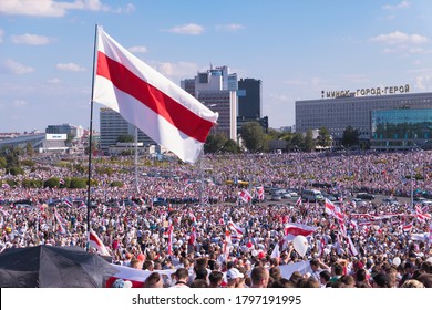 Minsk, Belarus, August 16, 2020: Protest against Lukashenko winning on president elections. Flag of Belarus close up. Crowd of people on meeting