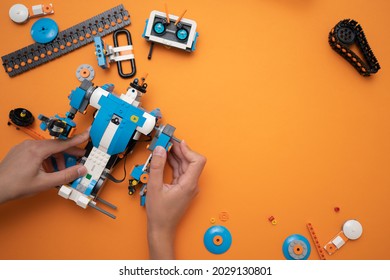 Minsk, Belarus. August, 2021. A Teenage Boy Constructs A Lego Boost Robot. STEM And ATEAM Education. DIY. AI. Educationsl Robot. Best Toy For Child.