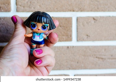 Minsk, Belarus - August 28, 2019: Baby Doll Lol In Hand. Cute Little L.O.L. LOL - Lil Outrageous Littles Surprise Toy From MGA Entertainment, Also Create Toys: Lalaloopsy, Num-Noms