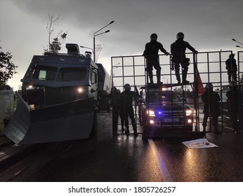 Minsk / Belarus - August 30 2020: Riot Police Blocking The Road For Protesters With Water Cannons, Cages And Shields