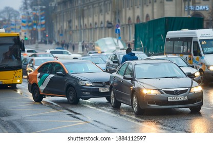 Minsk, Belarus. Dec 2020. VW Polo hit Mazda from behind, rear end collision. Car crash collision in winter. Car accident on city road.