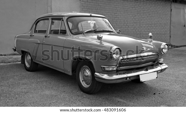 Minsk. Belarus. East Europe August 2,2016 Beautiful\
photo of a stunning retro car. Stylish vehicle. Nostalgia of past\
time. Cars of the time of Soviet Union. Black and white\
photography. Moscow\
style