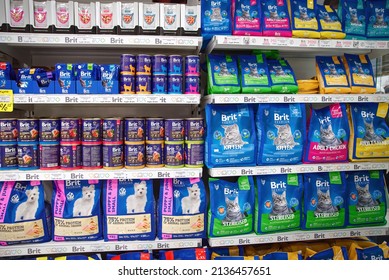 Minsk, Belarus. Feb 2022. Pet Food Brit, Sales Of Food For Dogs And Cats On Display At Pet Store. Dog And Cat Food Products At Supermarket Shelf. Dry And Wet Cat And Dog Food Aisle At Pet Supply Shop