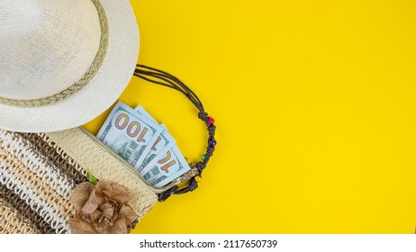 Minsk, Belarus - February 3, 2022: Summer Vacation Background With Money, Beach Hat And Bag. Top View, Copy Space