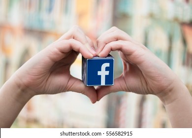 Minsk, Belarus - January 5, 2016:The Most Popular Social Network In The World. Facebook Logo In The Hand.  Heart.
