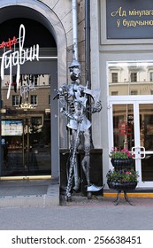 MINSK, BELARUS - JULY 15, 2014: Monument Tin Woodman Near Goodwin Cafe