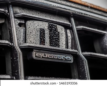 MINSK, BELARUS - JULY 28, 2019: Close Up Image Of A Radar And Vision Device Of A Modern SUV Audi Q8. This Module Enables Adaptive Auto Pilot Functions And Night Vision. Quattro Logo.