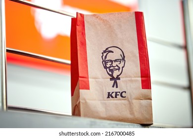 Minsk, Belarus. Jun 2022. KFC Paper Bag. Kentucky Fried Chicken (KFC) Paper Bag, Takeout From Restaurant Chain. Take Away Food From KFC Restaurant