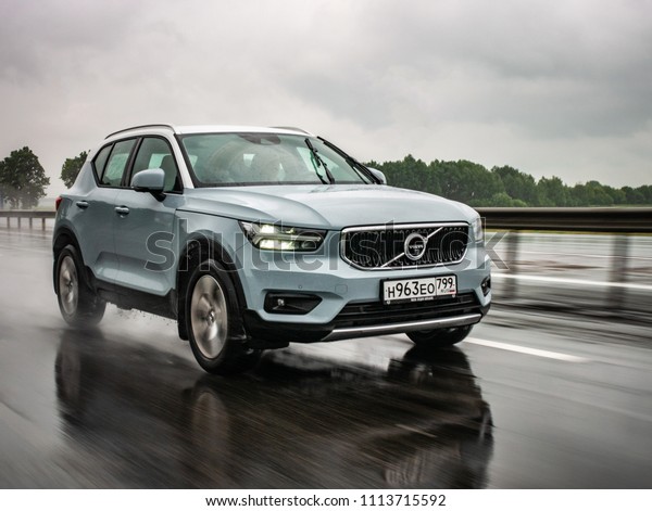 Minsk, Belarus - June 15, 2018: Volvo XC40 drives\
on a highway during rainy summer day. Volvo XC40 is the first\
subcompact SUV by Volvo. Under the bonnet of this T5 AWD model is a\
2.0 turbo engine.