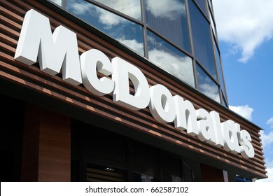 MINSK, BELARUS - june 16, 2017: Logo above the entrance to McDonald's Restaurant. McDonald's is the world's largest chain of hamburger fast food restaurants
