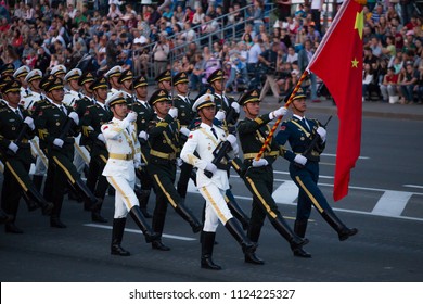 Minsk / Belarus - June 28, 2018 General Rehearsal Of The Military Parade In Belarus. Chinese Soldiers Marching Along The Avenue
