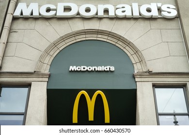 MINSK, BELARUS - june 7, 2017: Logo above the entrance to McDonald's Restaurant. McDonald's is the world's largest chain of hamburger fast food restaurants