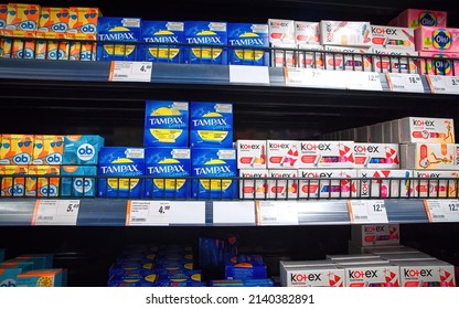 Minsk, Belarus. Mar 2022. Women`s hygiene products on shelf in supermarket. Feminine hygiene products in grocery store. Sanitary protection for women, sanitary napkins and tampons 