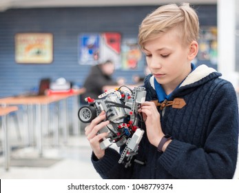 Minsk, Belarus. March, 2018. Boys Construct And Code Robots. Lego Mindstorms EV 3 Competition. STEM Education.  Concept Of Battle. Robotics Class For Child And Teen. School.  Mathematics. Science. 