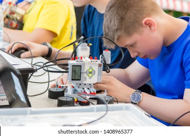 Minsk, Belarus. May, 2019. Boys And Girls Construct And Code Robots. Lego Mindstorms EV 3 Robot. STEM Education.   Robotics Class For Child And Teen. STEAM. Mathematics. Science. Technology. Art.