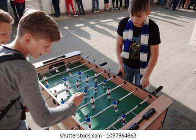 MINSK, BELARUS - MAY 23, 2018: Little Fans Plays Table Soccer Before The Belarusian Premier League Football Match Between FC Dynamo Minsk And FC Bate At The Tractor Stadium.