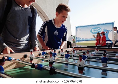 MINSK, BELARUS - MAY 23, 2018: Little Fans Plays Table Soccer Before The Belarusian Premier League Football Match Between FC Dynamo Minsk And FC Bate At The Tractor Stadium.