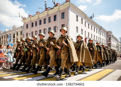 Minsk, Belarus - May 25, 2019. Group Of People Dressed As Soviet Soldiers Of The World War Takes Part In The Parade.