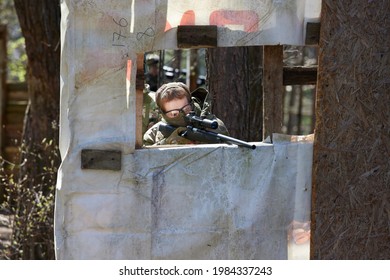 Minsk, Belarus, May 9, 2021 - Reporting of a real airsoft game in a forest with a backdrop of scenery. High resolution photos