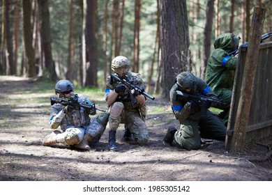 Minsk, Belarus, May 9, 2021 - Reporting of a real airsoft game in a forest with a backdrop of scenery. High resolution photos
