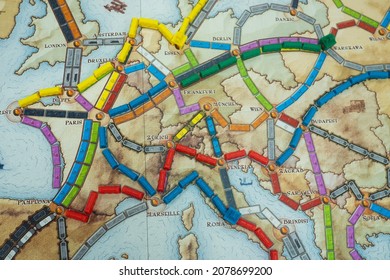 Minsk, BELARUS - November 3, 2021: Strategic Board Game Ticket To Ride With Trains, Trade And Expansion Options On A Map Of Europe