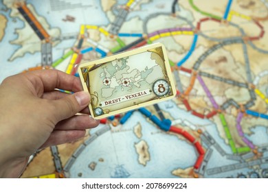 Minsk, BELARUS - November 3, 2021: Strategic Board Game Ticket To Ride With Trains, Trade And Expansion Options On A Map Of Europe