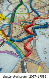 Minsk, BELARUS - November 3, 2021: Strategic Board Game Ticket To Ride With Trains, Trade And Expansion Options On A Map Of Europe