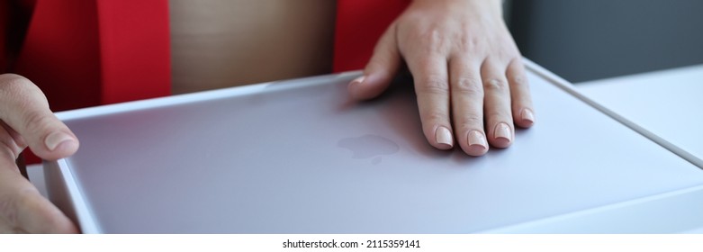 Minsk, Belarus, October 11, 2021: Woman Unboxing New MacBook Air, Laptop For Work Concept