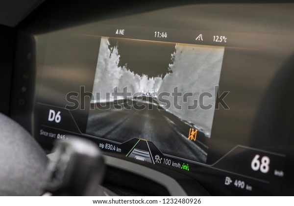 MINSK, BELARUS - OCTOBER 2, 2018: Night vision\
automotive system of the third generation of Volkswagen Touareg.\
Camera broadcasts image from the night vision system to the digital\
instrument panel.\
