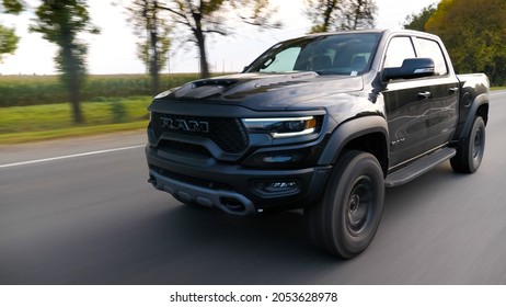 Minsk, Belarus - September 10, 2021: Dodge Ram TRX drives on a country road. Ram TRX is the most powerful series-production pick-up. Its 6,2-liter Supercharged V8 delivers 702 hp.