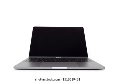 Minsk, Belarus - September 30, 2019 : A New MacBook Pro In Color A Grey Space And Near The Old MacBook Air