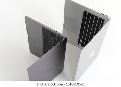 Minsk, Belarus - September 30, 2019 : A New MacBook Pro In Color A Grey Space And Near The Old MacBook Air