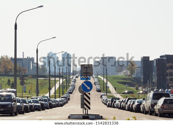 Minsk, Republic of Belarus - 10.14.2019:\
Spontaneous parking along the road during working hours. A large\
number of vehicles. Parking\
problems.