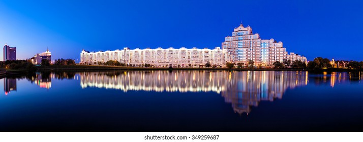 MInsk Skyline Panorama Over Svisloch River In Night. Minsk, Belarus