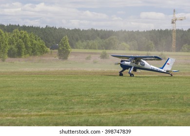 Minsk,Belarus-June 21,2014:Airplane PZL 104 Wilga On Takeoff And Landing Strip In Front Of Spectators On Aviation Event Of 80th Anniversary DOSAAF Foundation In Minsk On June 21,2014 In Minsk,Belarus