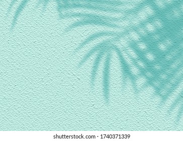 Mint Blue cement texture wall leaf plant shadow background.Summer tropical travel beach with minimal concept. Flat lay pastel color palm nature. - Shutterstock ID 1740371339