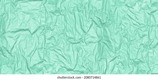 Mint Green Crumpled Paper Texture. Wrinkle Pattern Pastel Color. Abstract Wide Vintage Background