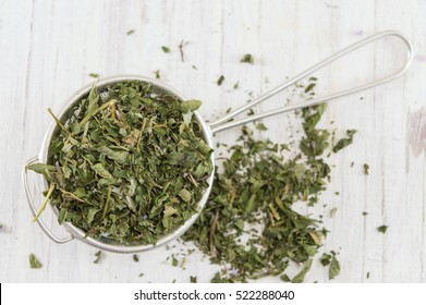 Mint tea natural herbs on a wooden table