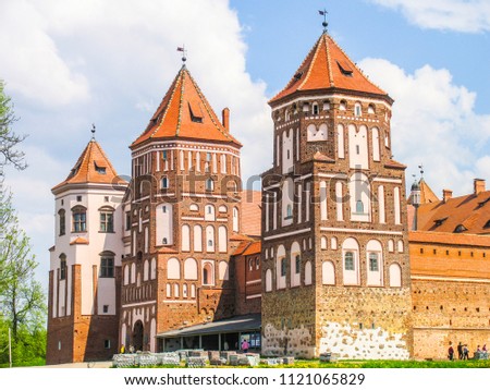 Mir, Belarus. Castle Complex Mir On Sunny Day with blue sky Background. Old medieval Towers and walls of traditional fort from unesco world heritage list