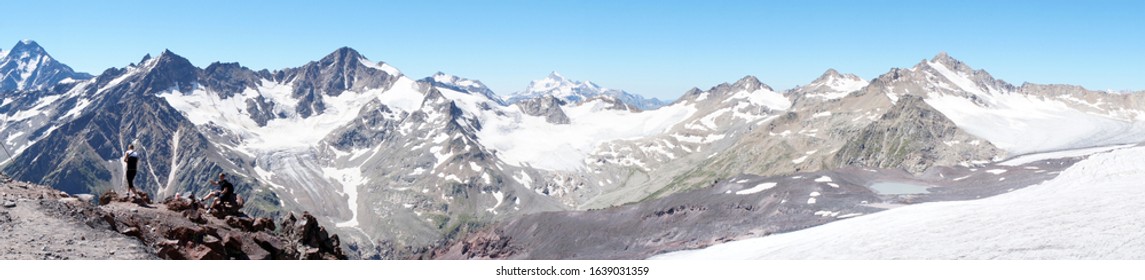 Mir station, Kabardino-Balkarian Republic, Russia - July 30, 2015: panorama from Mount Elbrus from the station of the pendulum cableway Mir to the Caucasus Mountains and snow-capped peaks.            - Shutterstock ID 1639031359